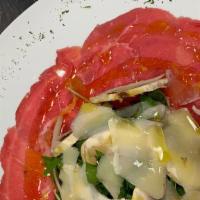 Carpaccio Di Carne · Thin sliced beef, fresh mushrooms, shaved parmigiano reggiano dop topped with extra virgen o...