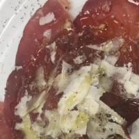 Bresaola E Scaglie Di Parmigiano · sliced cured italian style beef served with rugula and topped with parmigiano reggiano shave...