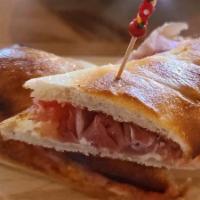 Spanish Sandwich · Bread baguette with serrano ham and manchego cheese.