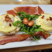 Eggs Benedict · 2 eggs any Style with ham and French toast with butter.