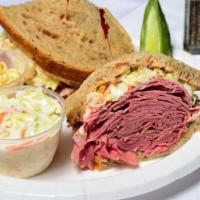 Y. Special · Your Choice of Meat Topped with Coleslaw & 1000 Island Dressing on Rye.