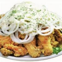 Snow Onion Whole Chicken · Crispy fried chicken with our signature sweet and creamy white sauce on sliced sweet onions.