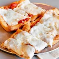 Classic Cheese Pizza · Mozzarella, Parmesan, Romano, fresh Italian herbs.