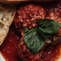 Meatballs · 3 of mama’s famous meatballs and a side of toasted ciabatta bread.