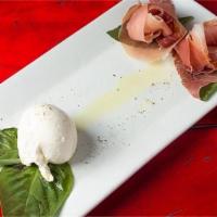 Burrata · Buffalo Mozzarella with a creamy center. 4 oz platter served with your choice of prosciutto ...