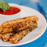 Mozzarella Sticks · 4 lightly fried fresh mozzarella sticks, served with Ragu’ sauce