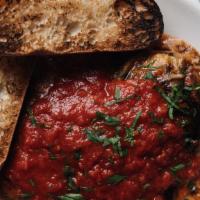 Eggplant Parmesan · Our famous eggplant with a side of toasted ciabatta bread