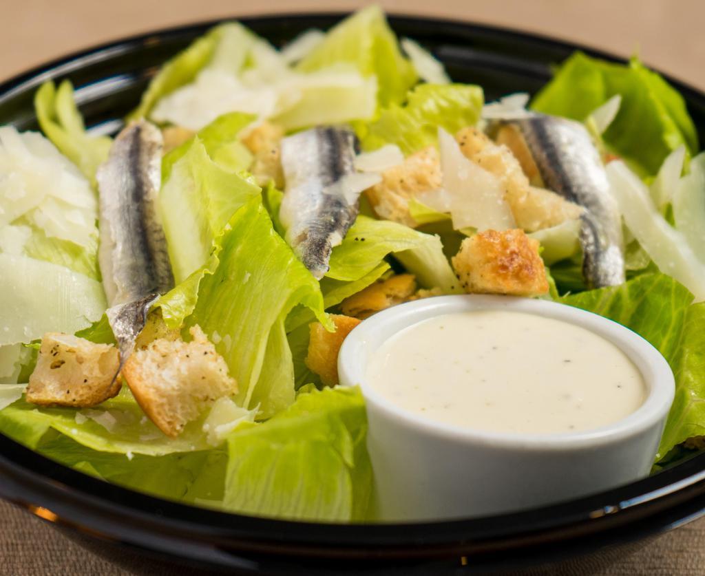“Cesare” Salad · Romaine, anchovies, shaved pecorino, neapolitan croutons, and luca’s homemade caesar dressing.