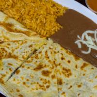 Super Quesadilla Steak · Flour tortilla with cheese, you can choose chicken, steak, or spicy pork and comes with rice...