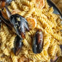 Pasta With Mix Seafood · seafood consists shrimp and black mussels.
