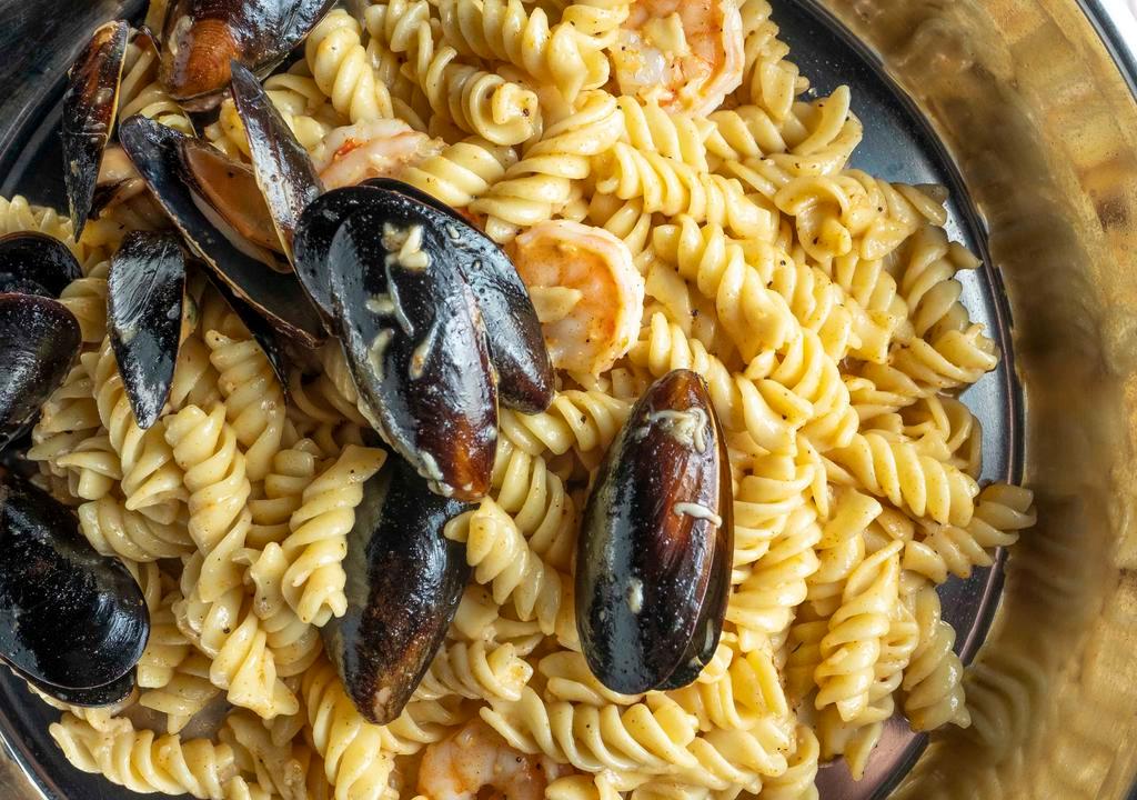 Pasta With Mix Seafood · seafood consists shrimp and black mussels.