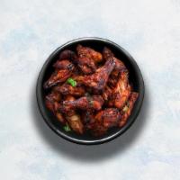 Tandoori Chicken Wings · Marinated in yogurt, fresh ground spices, and cooked in tandoor.