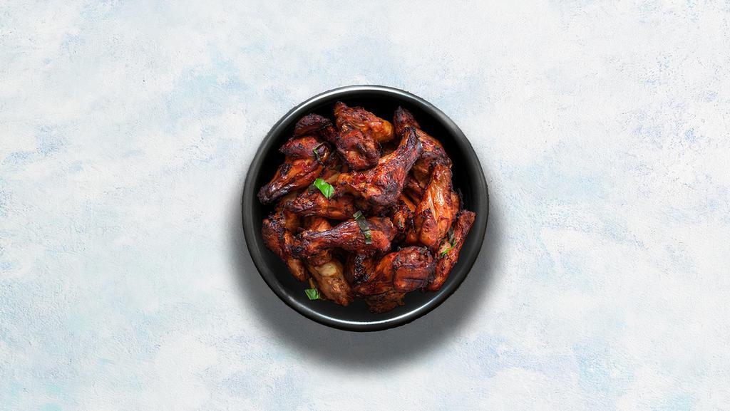 Tandoori Chicken Wings · Marinated in yogurt, fresh ground spices, and cooked in tandoor.