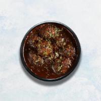Gobi Manchurian · Battered cauliflower florets tossed with ginger, garlic and tangy umami sauce in a tradition...