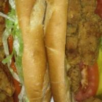 Oyster Po-Boy · All po-boy served on our fresh french bread. dressed with mayonnaise -lettuce tomato and pic...