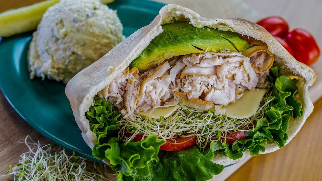 Turkey Avocado Pita * · Thin Sliced Turkey Breast, Swiss Cheese, Lettuce, Tomato, Mayo, Alfalfa Sprouts and Fresh Avocado Served in a Pita with your choice of Side Item, a Pickle Spear and a side of Ranch.