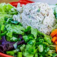 Chicken Salad Plate * · A Fresh Garden Salad with a Scoop of our Famous Chicken Salad served with Roma Tomatoes, Bel...