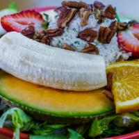 Chicken & Fruit Plate * · A scoop of our Famous Chicken Salad surrounded with Slices of Pineapple, Apple, Orange, Hone...