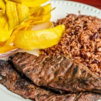 Carne Asada · Grilled steak served with either rice or gallo pinto (rice with red beans combined), comes w...