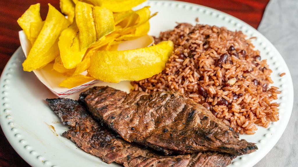 Carne Asada · Grilled steak served with either rice or gallo pinto (rice with red beans combined), comes with aside of fried sweet plantains, or fried green plantains, or tortilla. Included also is coleslaw and hot sauce on the side.