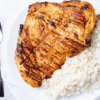Pechuga Asada · Grilled chicken served with either rice or gallo pinto (rice with red beans combined), comes...
