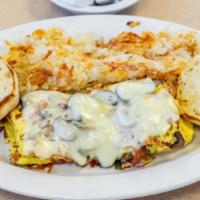 Bacon, Mushroom & Swiss Omelet · A delicious combination of bacon, mushroom, and swiss cheese.