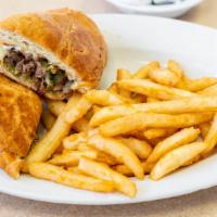 Philly Cheesesteak · Angus Philly beef steak chopped and grilled just right, then smothered with onion, green bel...