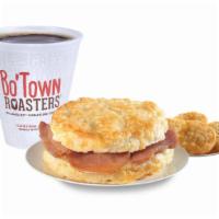 Country Ham & Egg Biscuit (Combo) · Cured country ham on a made-from-scratch buttermilk biscuit, grilled and made better with an...