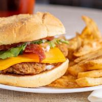 Cajun Filet Club Sandwich (Combo) · A uniquely seasoned chicken breast filet, American cheese, hardwood-smoked bacon, lettuce, t...
