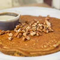 Sweet Potato Pancakes · Lightly sweet southern style pancakes served with a warm caramelized brown sugar butter and ...