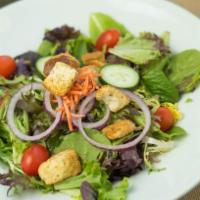 House Salad · Mixed greens, cucumber, tomatoes, onions, and homemade croutons served with balsamic vinaigr...