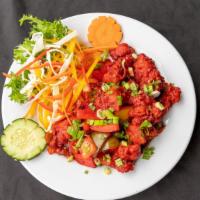 Chilli Chicken · Boneless chicken fried and cooked in a combination of Indian vegetables and Chinese flavors.