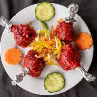 Chicken Lollipop · Chicken wings (4 Pieces) marinated in spices coated in zesty batter & deep fried and garnish...