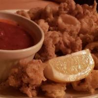 Calamari Fritti · Battered squid flash fried with fra diavolo sauce.
