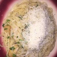 Capellini Elena  · Angel hair pasta, sauteed shrimp, and spinach finished in a parmesan cream sauce