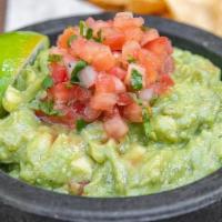 Guacamole And Chips (Gluten Free/Vegan) · Fresh homemade guacamole with bass avocados, onions, cilantro and pico. served with freshly ...