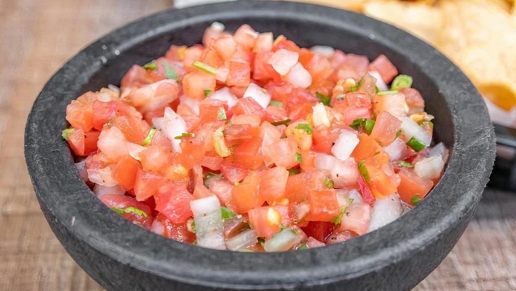 Pico De Gallo And Chips (Gluten Free/Vegan) · Fresh Pico de Gallo with tomatoes, white onion, and cilantro. Served with our freshly fried homemade chips. (Gluten free)