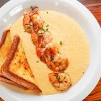 Shrimp & Cheese Grits · Grilled Shrimp over a bed of Cheese Grits