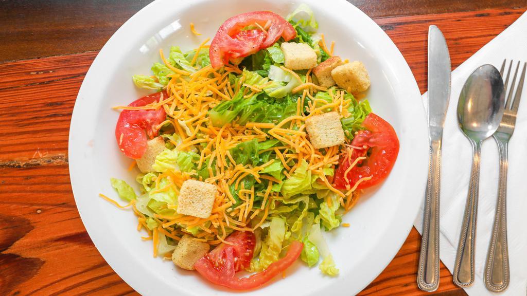 House Salad · Lettuce/ spinach mix with tomatoes, and croutons. Add chicken, salmon or shrimp for an additional charge.