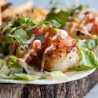 Shrimp Tacos · Flour tortilla, sautéed shrimp, mango pico de gallo, spicy mayo, cilantro
