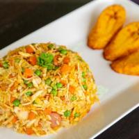 Yellow Rice Mixed With Shredded Chicken / Arroz Con Pollo · Tasty chicken with rice mixture & sausage, where fresh vegetables predominate such as corn, ...