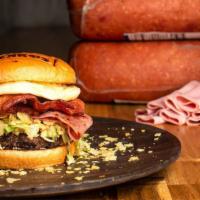 305 Porky Burger · Miami's most famous Burger! The 305 Juicy half pound beef burger topped with special house m...