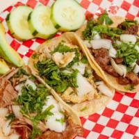 Tacos Mexicanos / Mexican Style Tacos · Pollo, carne o cerdo / Corn tortilla with chicken, beef or pork.