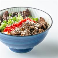 Beef Rice Bowl · marinated beef, caramelized onions, pickled ginger, bok choy . All Rice Bowls come with a Cu...