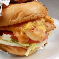 Shrimp Cheese Burger Combo · Topped with lettuce, tomato, onions, and homemade sauce. Comes with fries and drink.