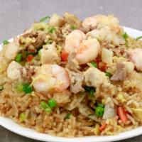 House Special Fried Rice · Chicken, Beef, Shrimp, egg, broccoli, onions, peas, carrots and green onion.
