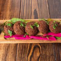 Falafel · Vegetarian chickpeas croquettes. Served with tahini sauce.