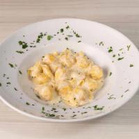 Fiocchi Di Pera E Gorgonzola · Imported Fiocchi egg pasta filled with pear and Gorgonzola cheese, served on cream, and whit...