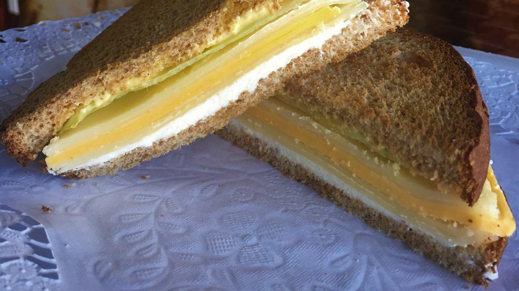 Triple Cheese Sandwich · On Toasted Wheat Bread: Swiss, American and Cream Cheese, Mayo, Butter, Lettuce, Olive Oil