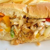 Chicken Cheesesteak + Fries · Grilled chicken, onions & peppers topped with melted cheese on a toasted bun